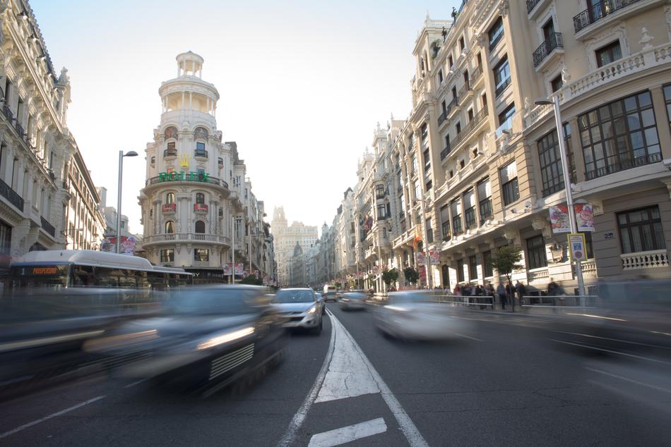 traffic on Gran Via street in blurred background