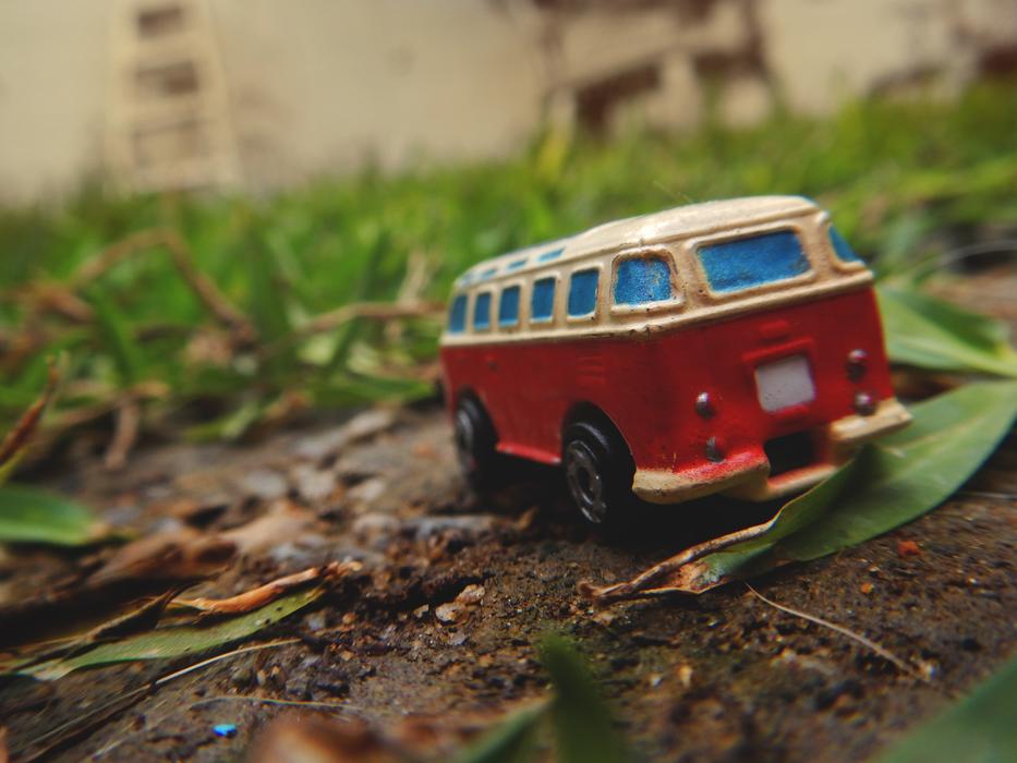 travel van as miniature model in blurred background