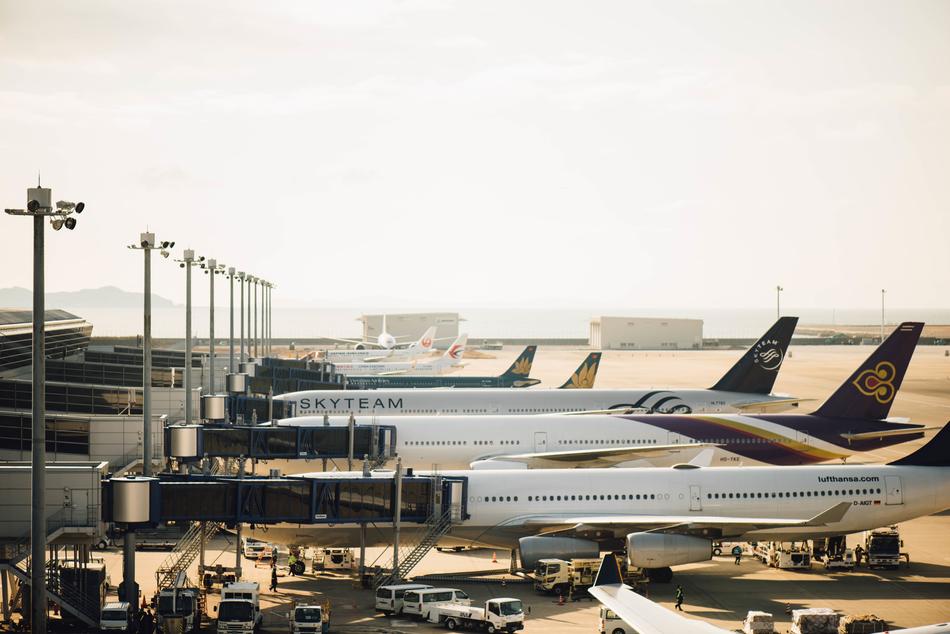 spotlights on poles and planes at the airport