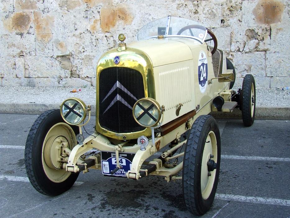 Shiny, vintage 'Citroen B12' on the road, near the wall