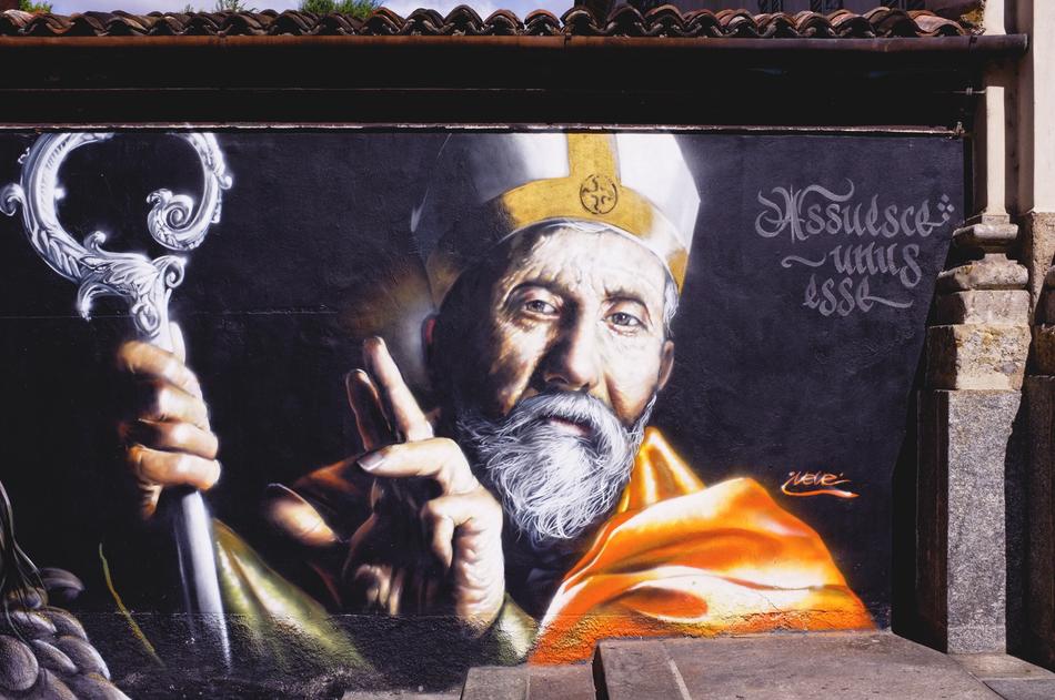 Colorful and beautiful graffiti with the man with beard, in Milan, Italy