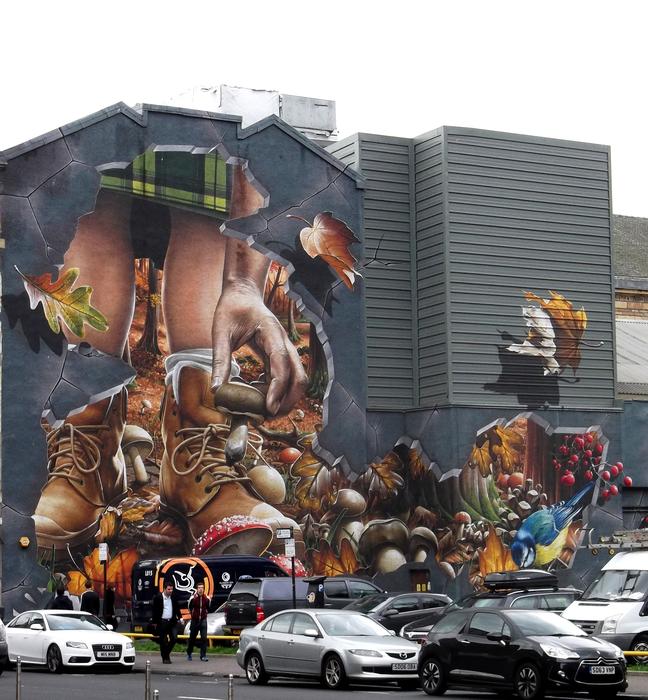 parked car on the background of the wall with graffiti