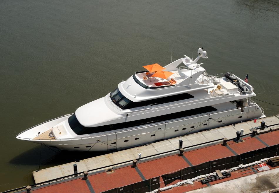 white luxury yacht at the marina