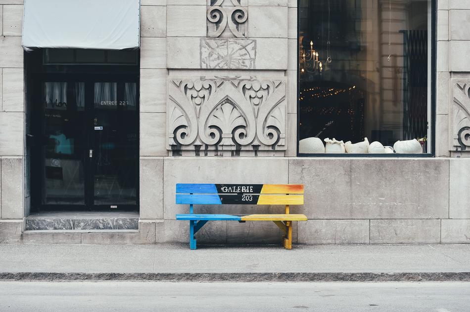 bright painted Bench at historical Building