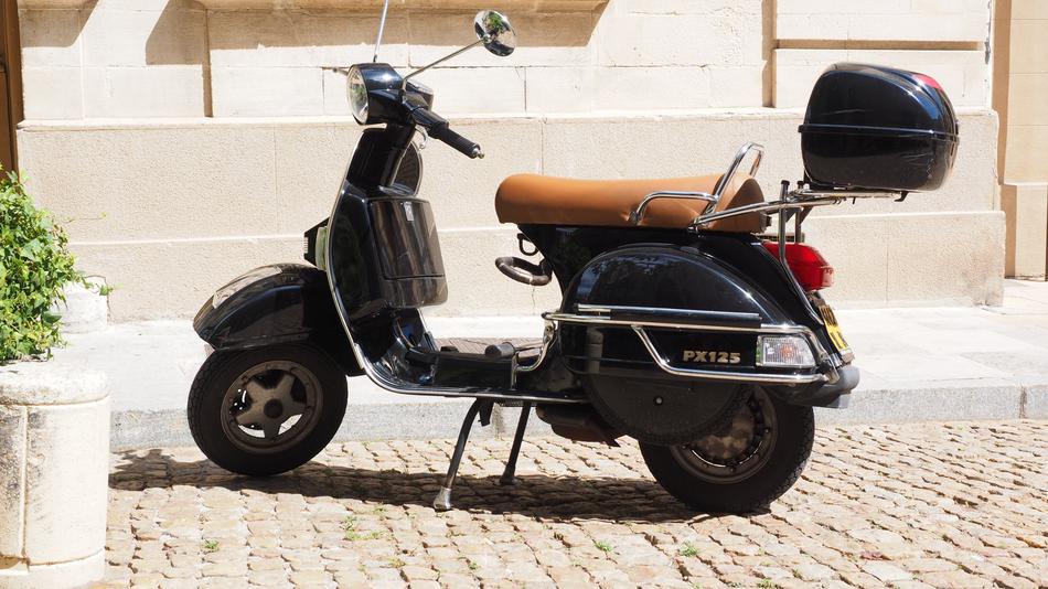 Roller Motor Scooter Vehicle on street