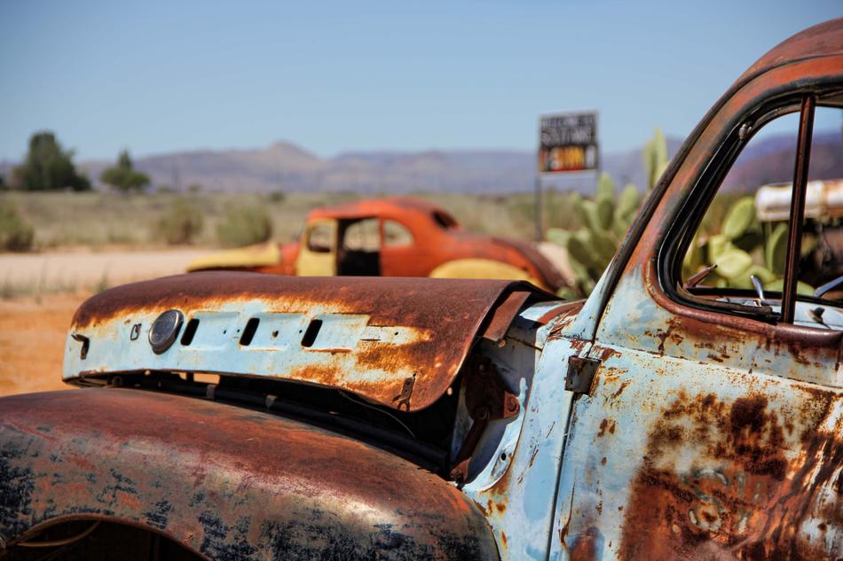 rusty cars in the desert in Namibia
