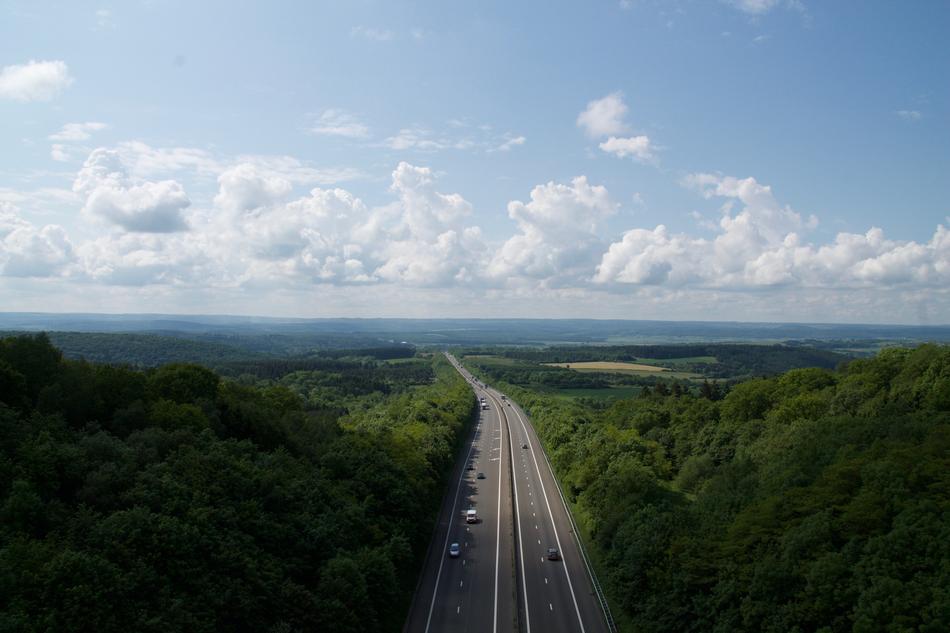 two-lane expressway in scenic rural landscape at summer
