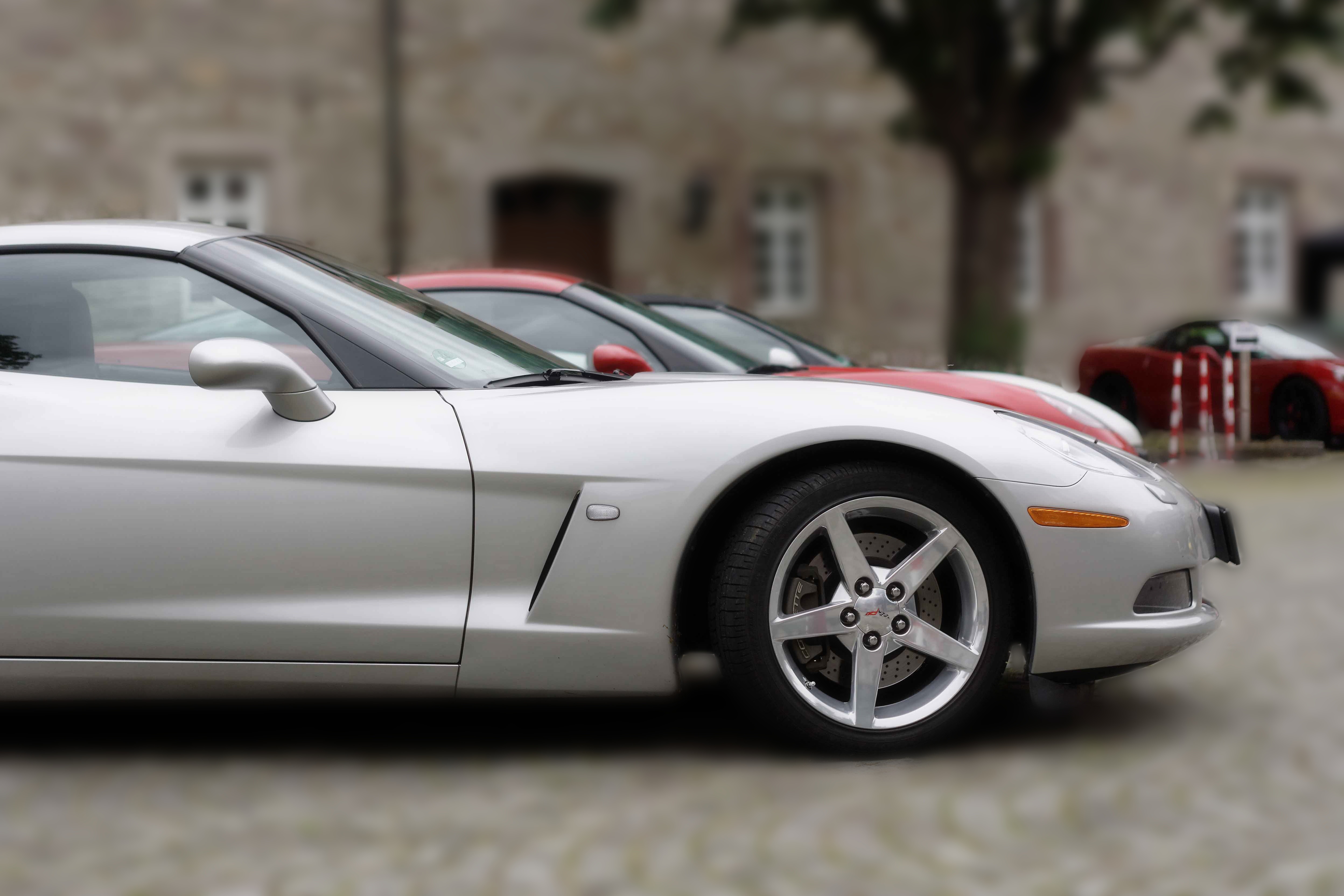 New expensive silver. Chevrolet Corvette c6 Маквин. Corvette c6 car parking. Chevrolet Corvette c6 молния Маккуин. Silver Sports car