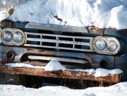 Old Automobile Snow Covered