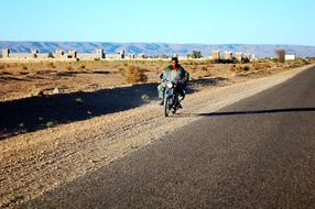 ride a motorcycle on the road to Morocco