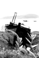 monochrome photo of boat valley scenery