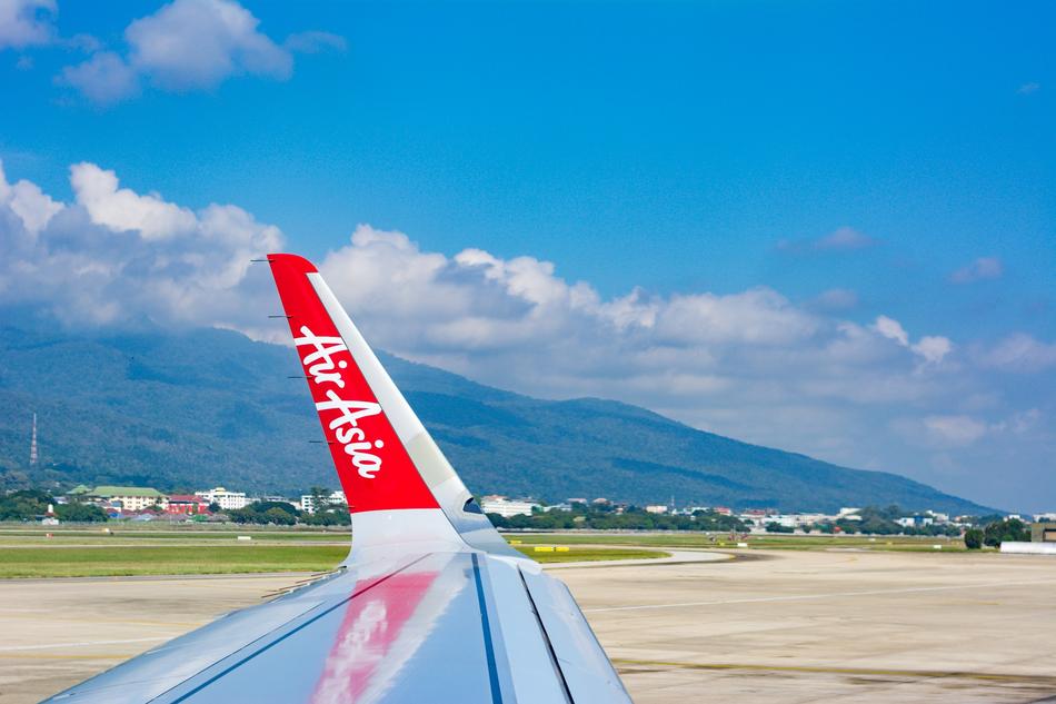 the inscription on the wing of the aircraft against the blue sky
