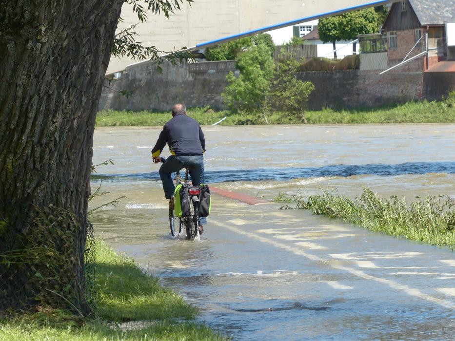 High Water Cyclists Wet Get