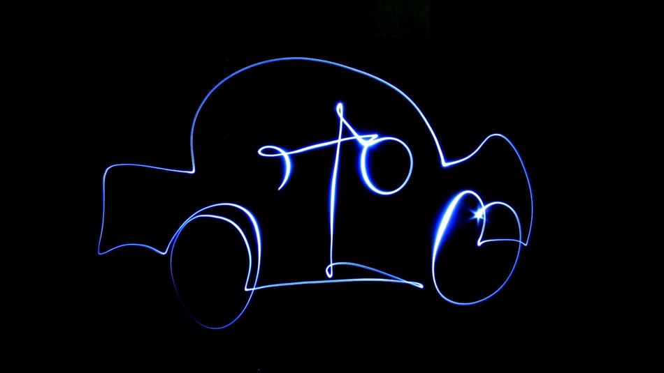 Drawing of a car on a black background