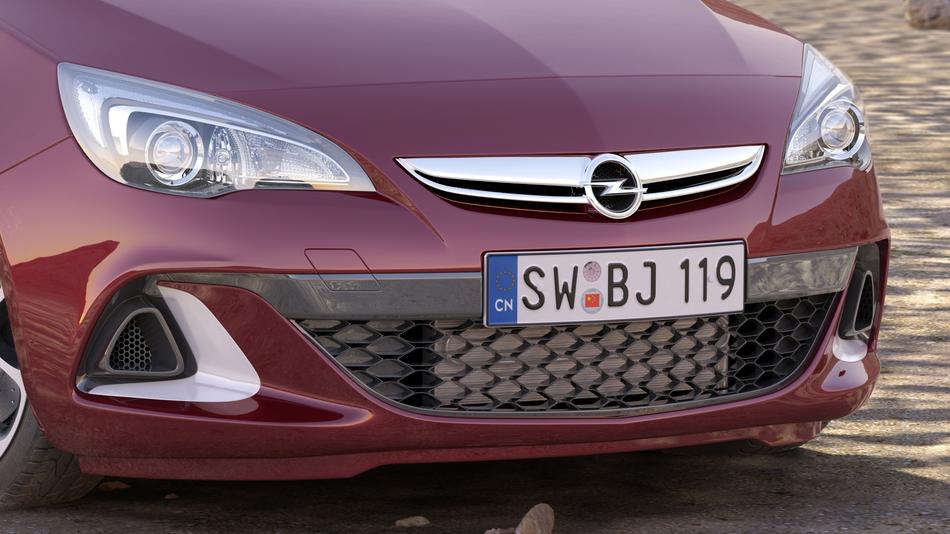 front on new red opel car close up