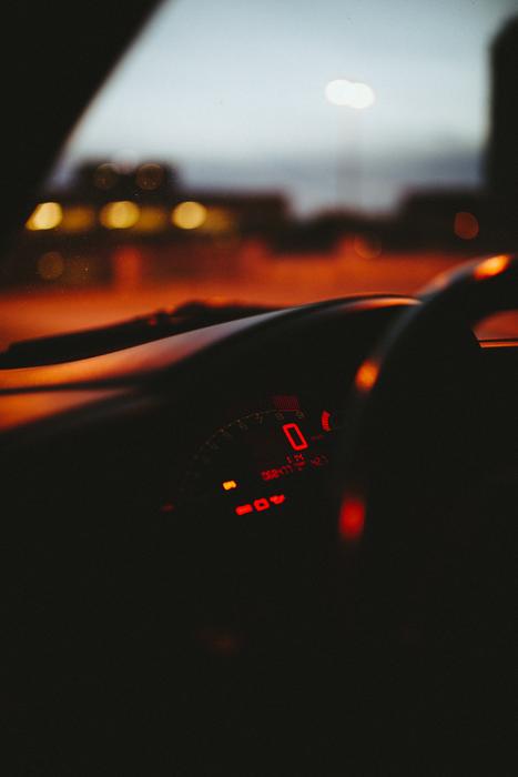 car interior with a view of the evening city