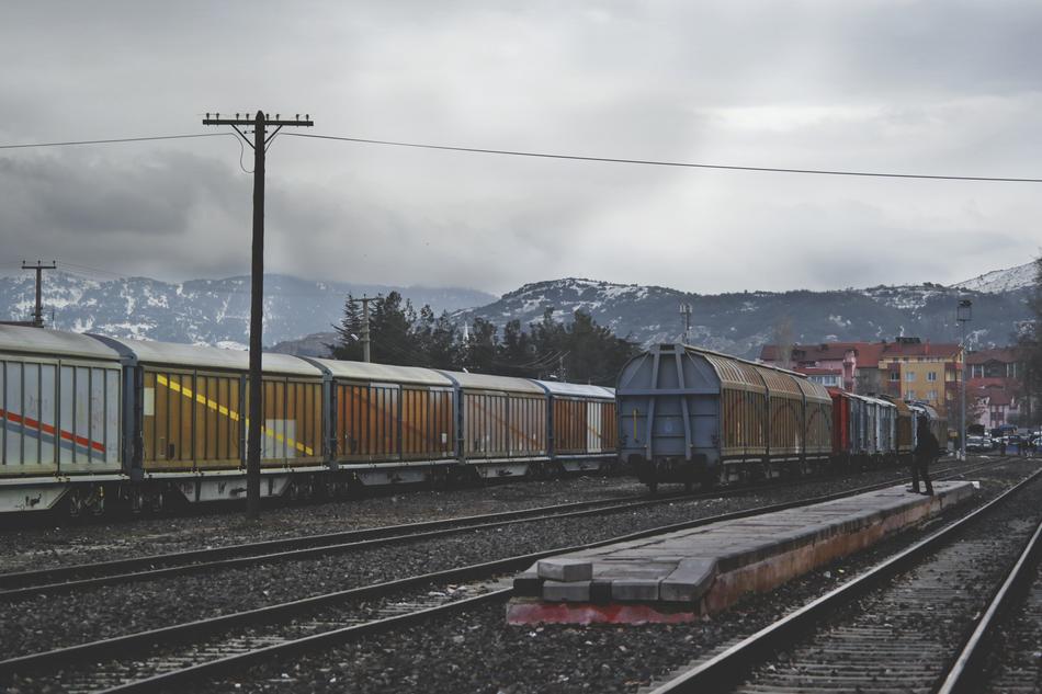 cargo Train on Railway near mountains