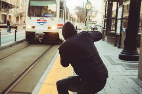 man by the train