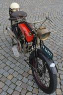 oldtimer Moped Moto Bicycle on pavement
