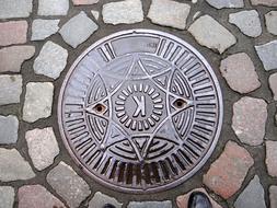 iron manhole cover on the road