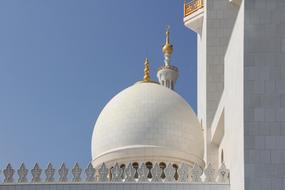 white domes of a mosque in Abu Dhabi, UAE