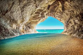 Rock cave on Beach Sea