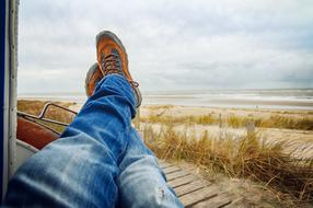resting man in hiking shoes