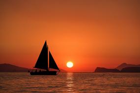 delightful landscape of Sailboat in Ocean at Sunset