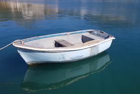 boat is tied to shore