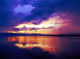 colorful evening sky over calm water
