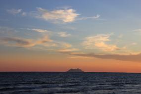 Mediterranean Sea with the island in Italy at sunset