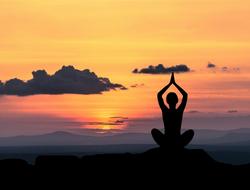 Meditation yoga at sunset