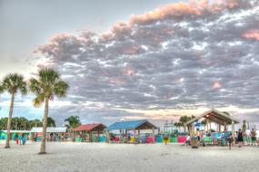 Beautiful landscape of the Pine Island with colorful buildings and palm trees on the beach in California, USA