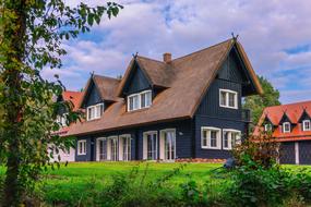 dark gray Wooden house in the village