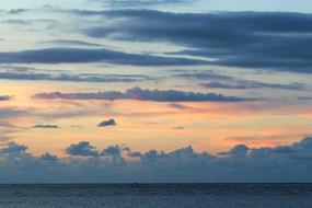 blue and pink clouds at Sunset Sky above sea, germany, Langeoog