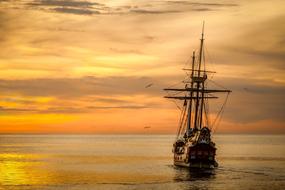 photo of Sailing Boat at Sunset