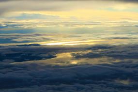 yellow sunset in thick clouds