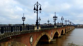 pont de pierre, historical bridge at cloudy day, france, Bordeaux