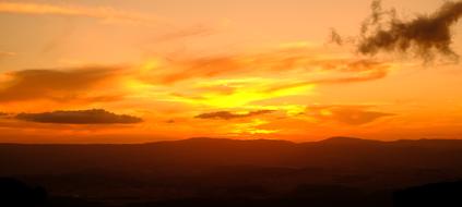 Beautiful landscape of the silhouettes of the mountains, at colorful, gradient sunset