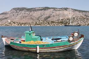 colorful Fishing Boat on water at coast, nobody, Greece