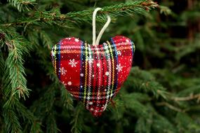 plush christmas heart on christmas tree