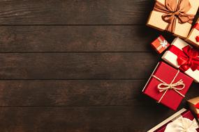Gift Boxes on wooden table, Christmas background