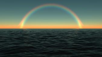 rainbow over the sea horizon