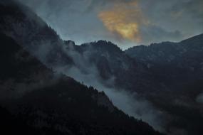 scenic foggy Mountains at dusk