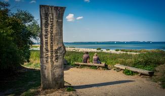 people on baltic coast on a sunny day