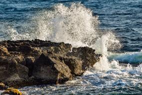 spray on the rocky shore in Ayia Napa, Cyprus