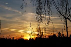 traces of airplanes in the bright evening sky