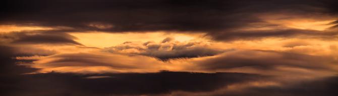 dramatic sunset with storm clouds