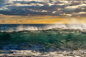 Wave Crashing Beach into the storm