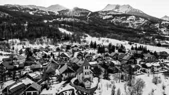 panoramic view of a mountain village in winter